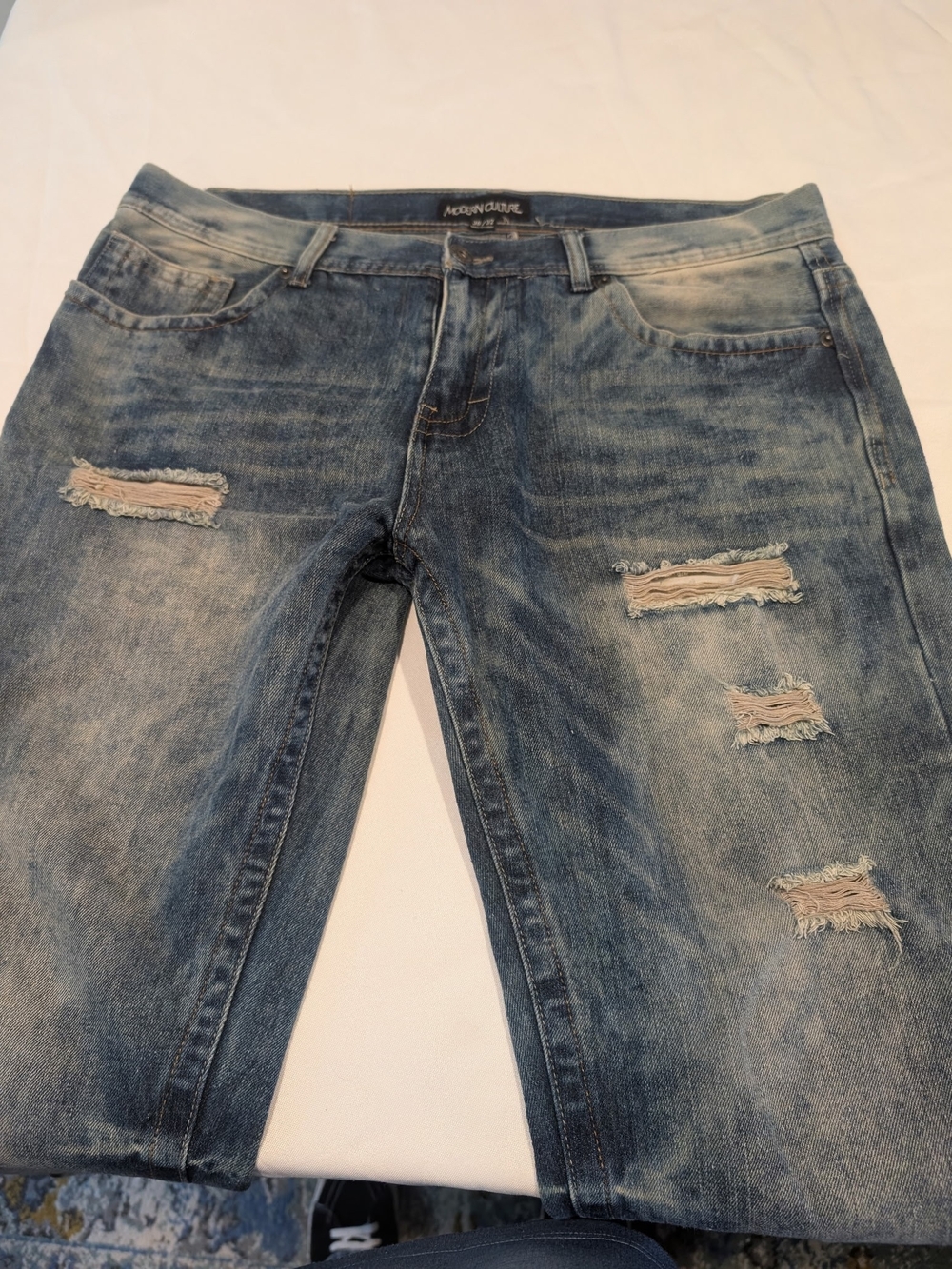 Distressed Men's Blue Denim Jeans
